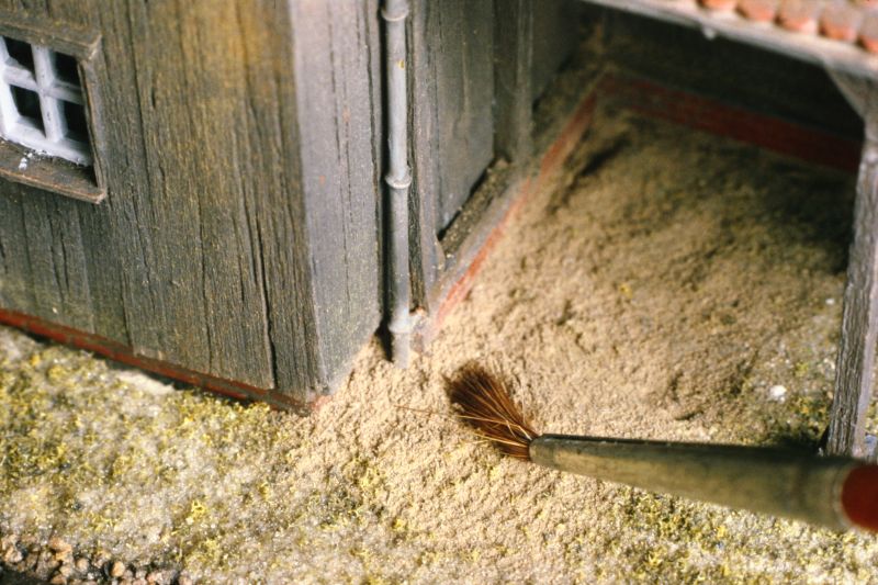 verteilen des Sandes