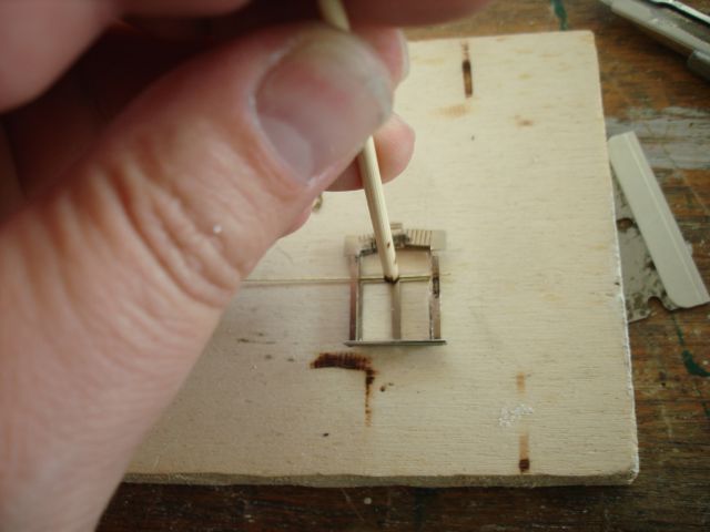 Halten mit Holzstab
