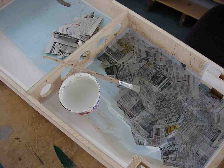 Die Grundplatte tapezieren