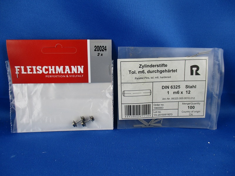 Achse und Zylinderstifte